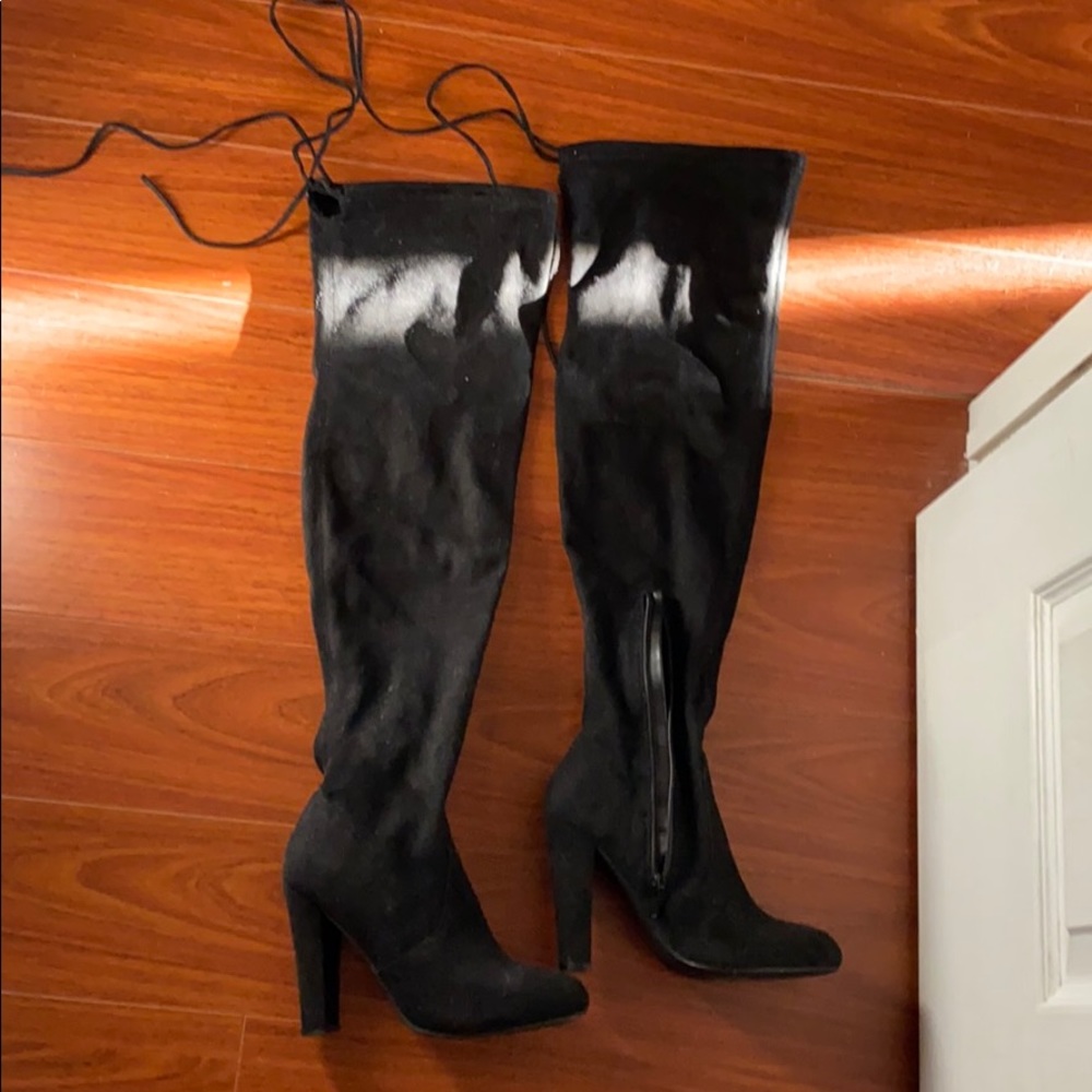 Thigh high black boots
